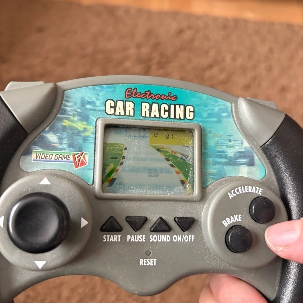 Toy Quest: Electronic Car Racing FX Handheld Video Game Tested and working